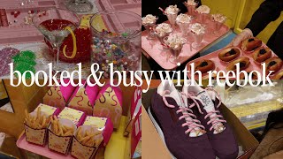 booked & busy with reebok