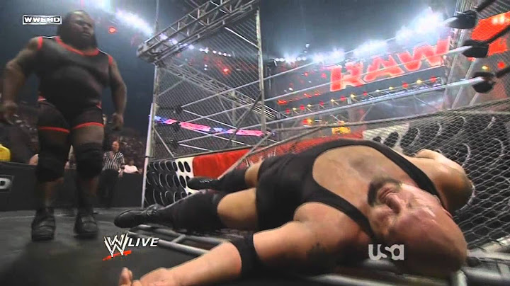 WWE - Mark Henry crash the Steel Cage on Raw 27 June 2011 [720p HD]