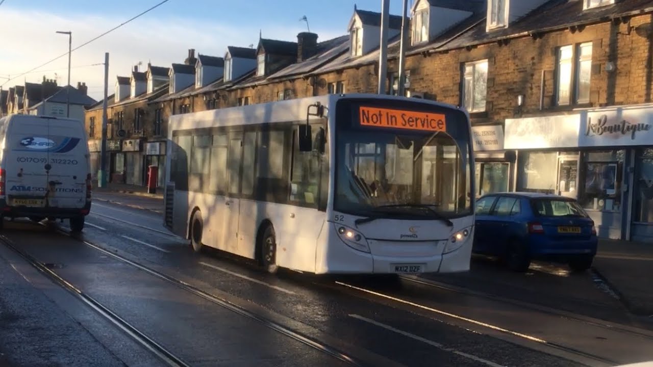 Powell's Bus & Coach 52 heads along Middlewood Road with a Not In