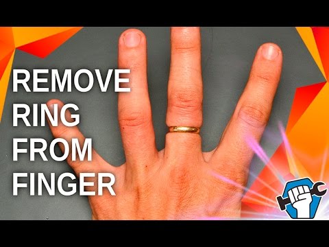 Крутить кольцо вокруг пальца. Обручальные кольца развод. Снять кольцо ниткой с опухшего пальца. Removing rung. Как снять кольцо с пальца с помощью нитки.