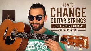 Changing Guitar Strings on a Steel String Acoustic Guitar for Beginners.