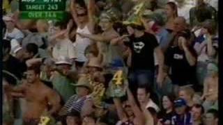 amazing one handed catch by fan while talking on his mobile