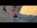 Jeep Gladiator Rubicon Saves Wrangler Jk From Rolling Down Hells Gate on Hells Revenge Moab Utah