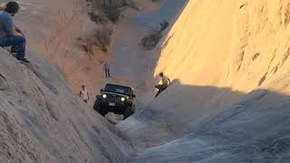 Jeep Gladiator Rubicon Saves Wrangler Jk From Rolling Down Hells Gate on Hells Revenge Moab Utah