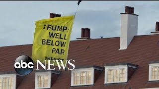 Protests against President Trump continue in Scotland while he prepares to meet Putin