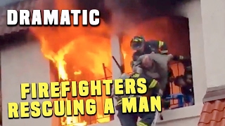 Dramatic Video Shows Firefighters Rescuing a Man From a Burning Apartment in Brockton Massachusetts