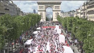 The Champs-Élysées Is Transformed Into A Massive Table For A Special Picnic Event