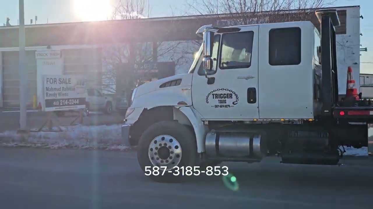 Towing Service in Bowness Calgary | Buzz (587) 318-5853 | Calgary Towing Truck