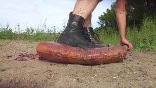 Dr. Martens Steel Toe Boots Stomp And Trample A Lot Of Food On Leather Cushion
