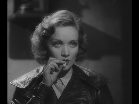 Marlene Dietrich smoking in leather (1931)