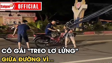 Cô gái "treo lơ lửng" giữa đường vì... lao thẳng vào búi dây cáp | Tin tức SaigonTV