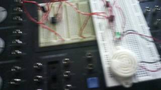 Led and buzzer supply from two connected push button switches