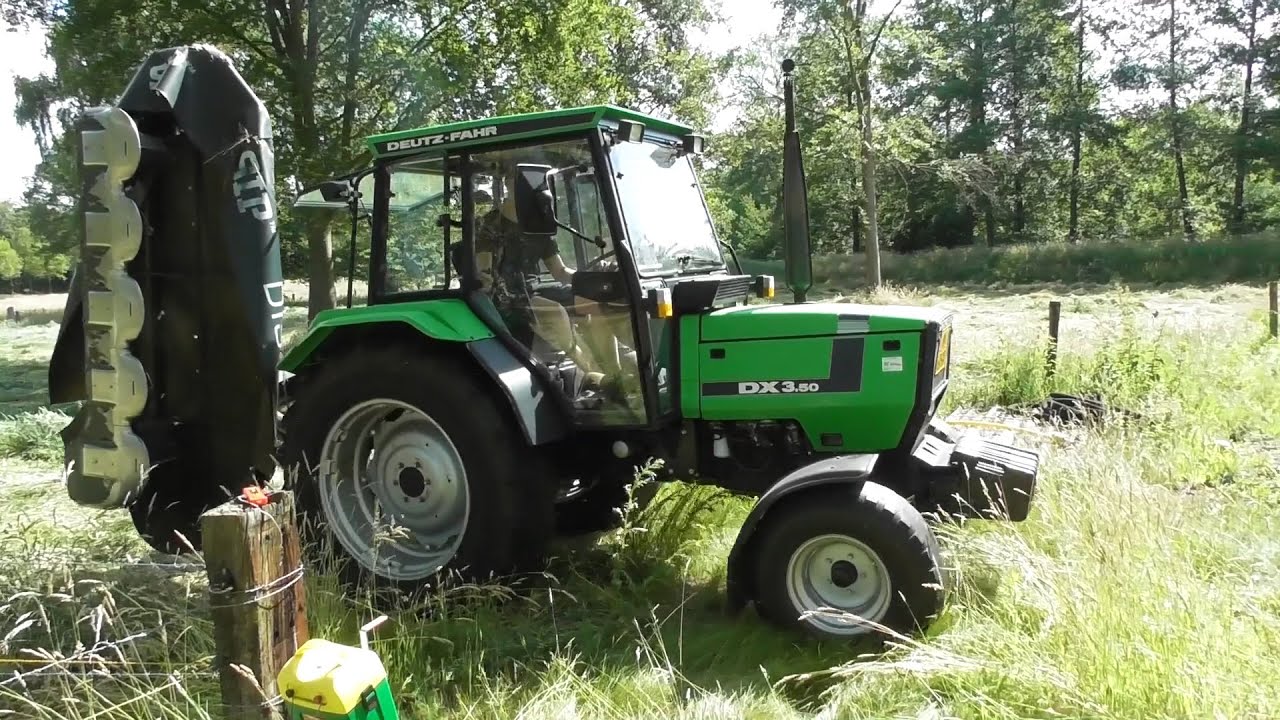 Mowing grass with Deutz-Fahr & SIP