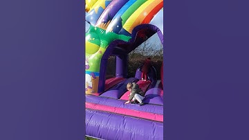 Unicorn bouncy castle with slide (disco ready)