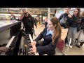 Schoolgirl stops by the piano on the way home