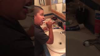 Watch How This Kid Brushes His Teeth Before School