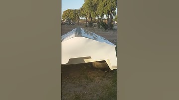 first of the bertrams Haines Hunter some more progress with fiberglassing and gel coating on boat(1)