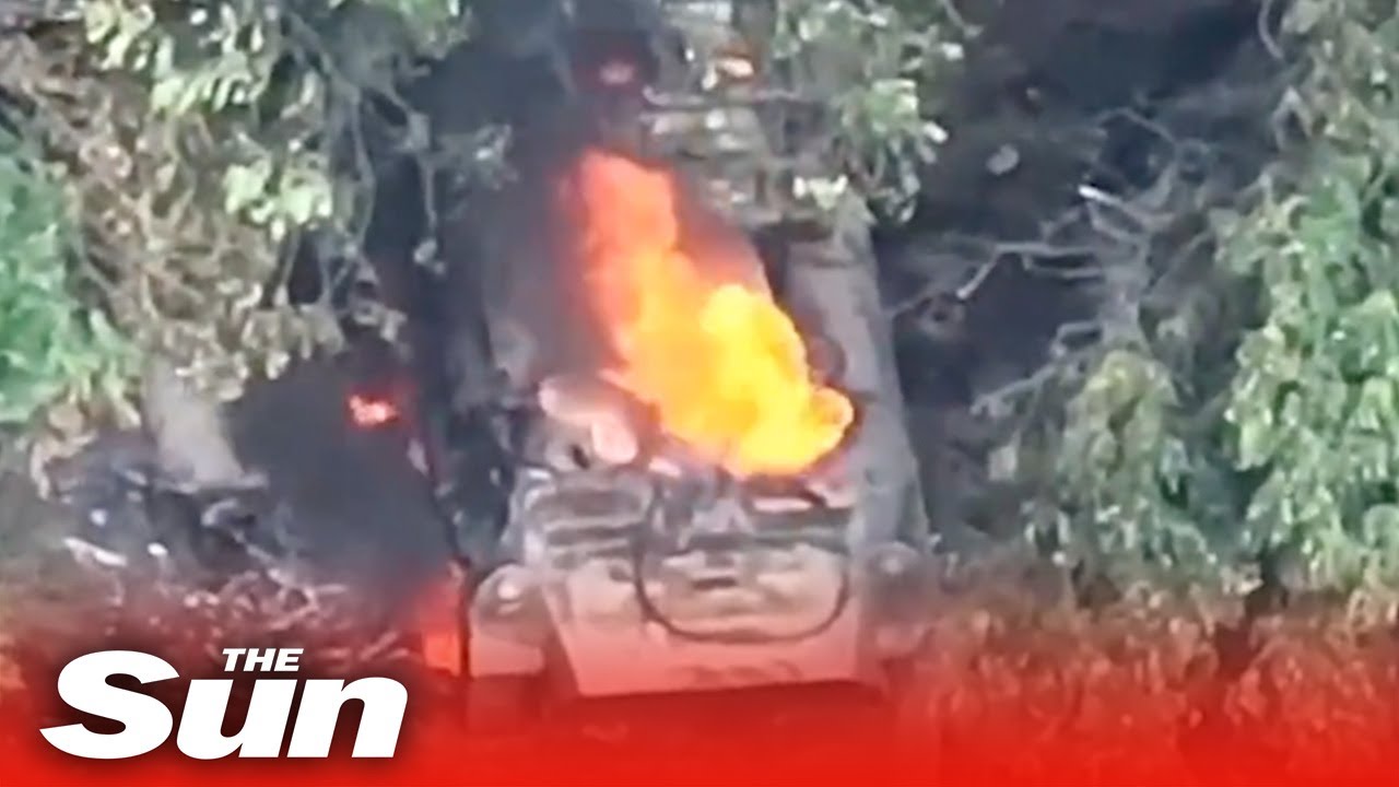 Russian tank set on fire after direct hit by Ukrainian drone strike