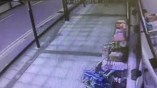 Guy falls outside shop