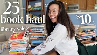 HUGE BOOK HAUL + thrifting books at a library sale!!