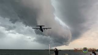 ROUGH LANDING! U S Air Force C 130 Lands right before a 80 MPH Thunderstorm