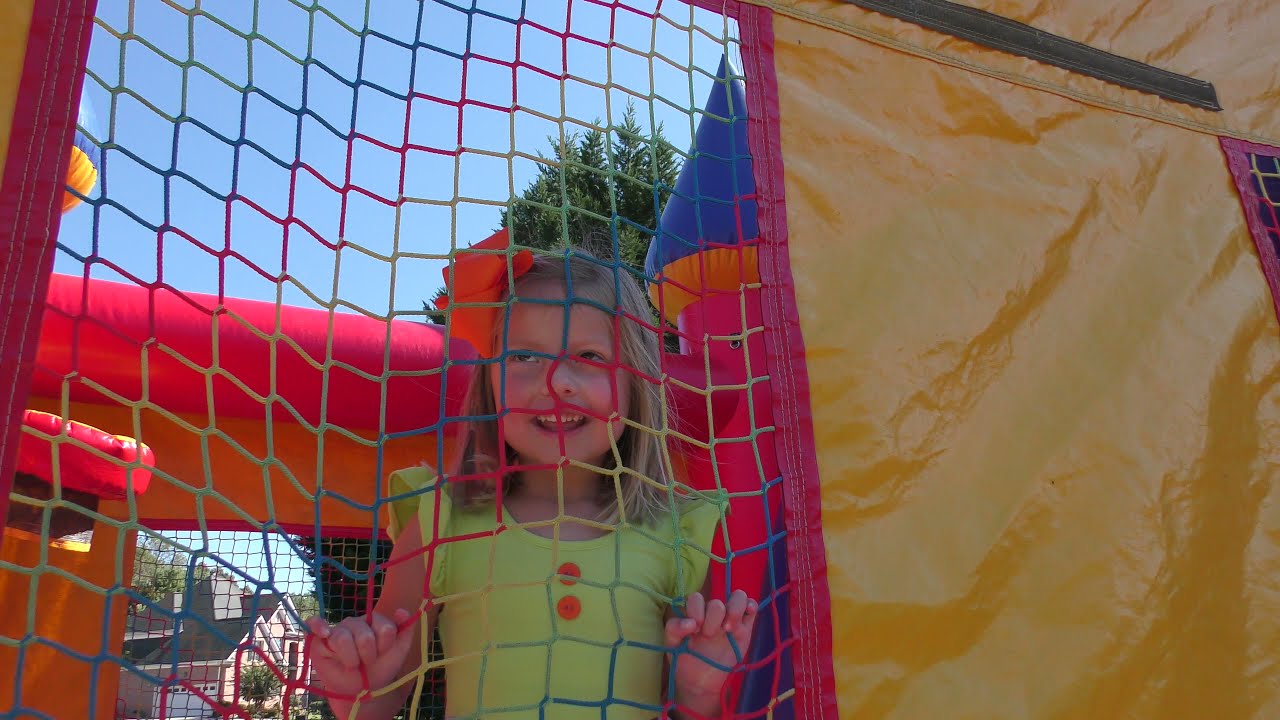 Playing on Bounce House at Tillman's 8th Birthday Party