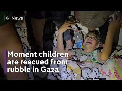 Moment Palestinians rescue children from rubble in Gaza