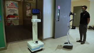 Robot talks to lifts, takes lift rides in a Singapore commercial building