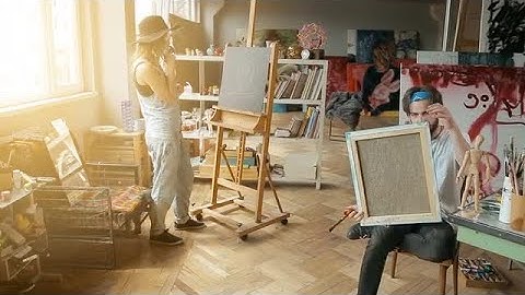Two Artists Paint In A Studio Stock Video