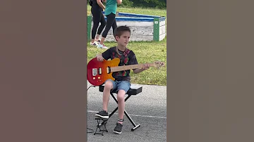 3rd grade talent show - Playing Seven Nation Army by White Stripes on the guitar