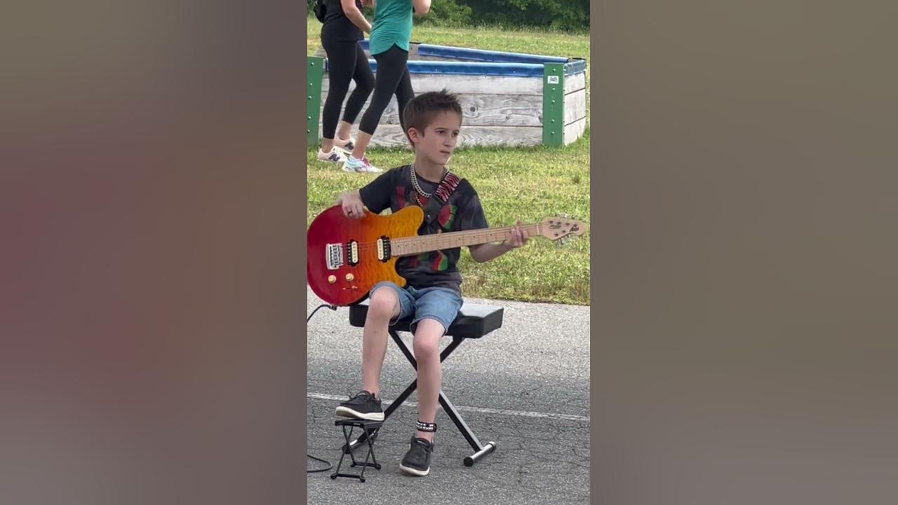 3rd grade talent show - Playing Seven Nation Army by White Stripes solo on the guitar