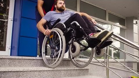 Disabled Man Descending Stairs Stock Video