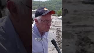 Sen. Bernie Sanders reacts to flood damage in Barre, Vermont