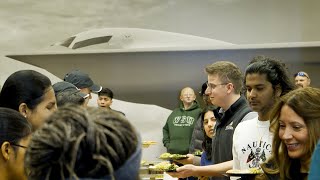 Hundreds enjoy holiday feast at Raidersgiving