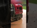 Washing the red truck toy