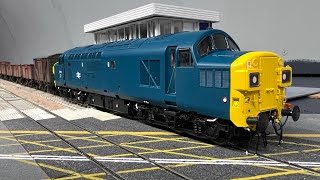 Class 37 with mixed Bauxite wagons passing the level crossing