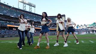 Sullyoon from global K-pop sensation NMIXX throws the first pitch