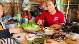 Grilled fish tuk trey dipping sauce and fresh lettuce and cucumber