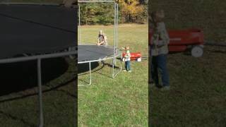 Nate and daddy putting up the trampoline!