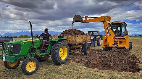 JCB 3dx Backhoe Loading Mud in Mahindra 475 Di tractor JCB 3dx eco expirt khudai Mud #jcb #jcb3dx