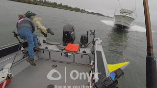 VIDEO: Fishermen leap overboard before being hit by oncoming boat