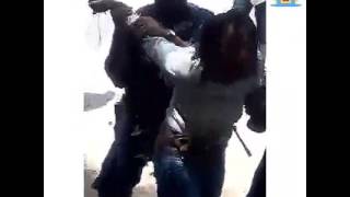 Smh...Jamaica police beat woman in public
