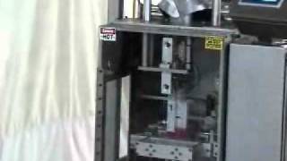 System Packaging Model 1200 Heat Seal Machine W Volcumentric Filler