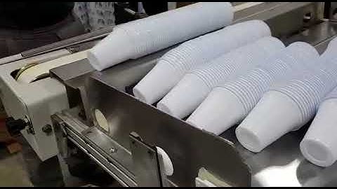 automatic plastic cup packaging machine ( Rotary Counter)  video take from Dubai factory
