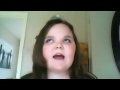 A girl is trying to sing I will always love you by Whitney Houston but keeps failing and gets angry