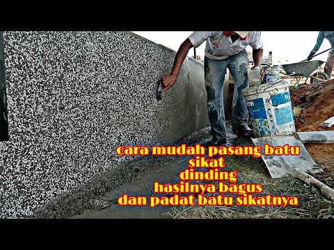 Video: Batu buatan di dinding. Meletakkan batu buatan di dinding