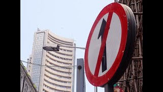 Sensex plunges 463 pts on Fed's hawkish tone; Nifty below 11,000