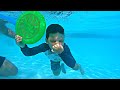 KIDS Swim in GIANT SWIMMING POOL! CALEB LEARNING TO SWIM UNDERWATER with Mom and Dad!