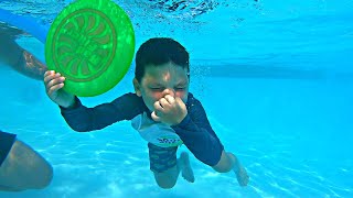 KIDS Swim in GIANT SWIMMING POOL! CALEB LEARNING TO SWIM UNDERWATER with Mom and Dad!