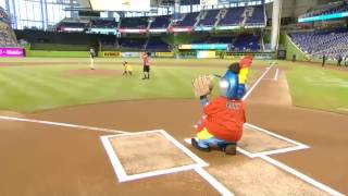 Dario Achury  throws the first pitch at Marlins Park